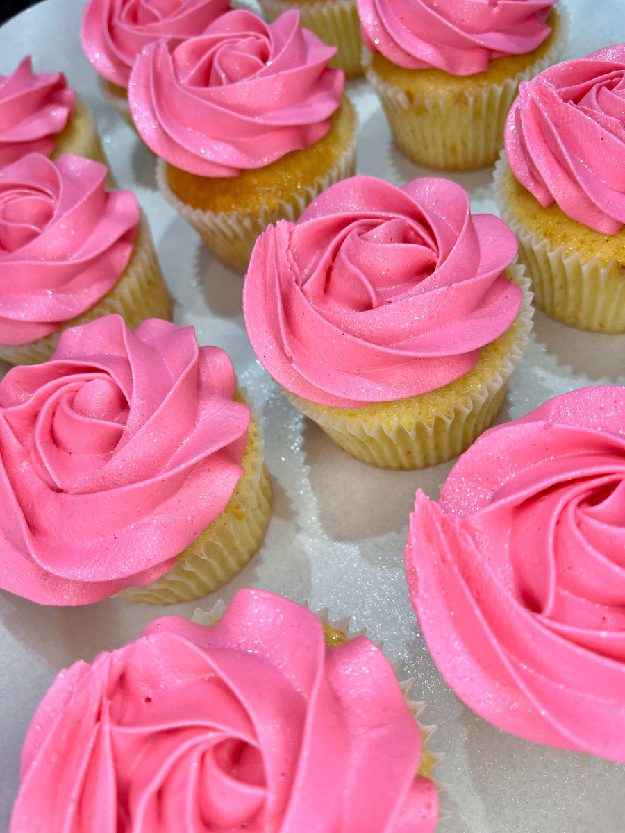 Bright pink rose cupcakes with glitter