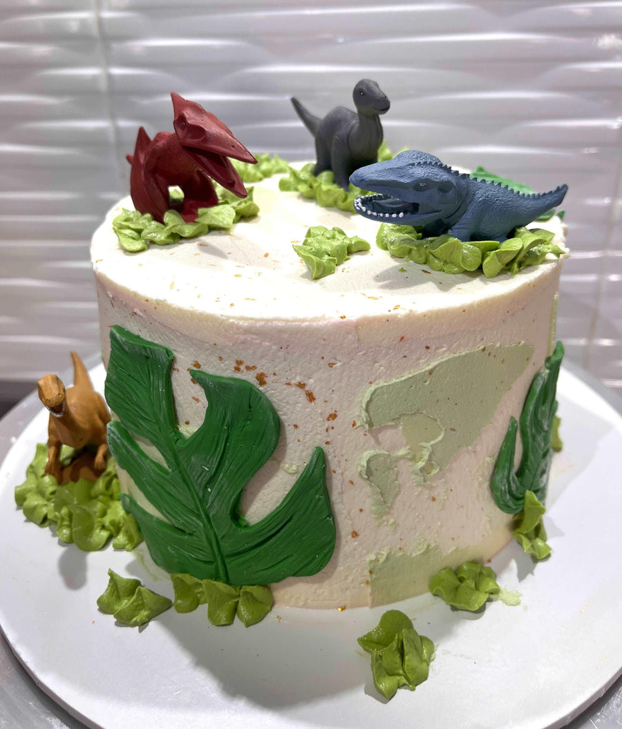 Dinosaur Cake Brisbane, Fun and colorful dinosaur-themed cake, perfect for kids' birthdays, featuring playful dinosaur decorations and vibrant colors