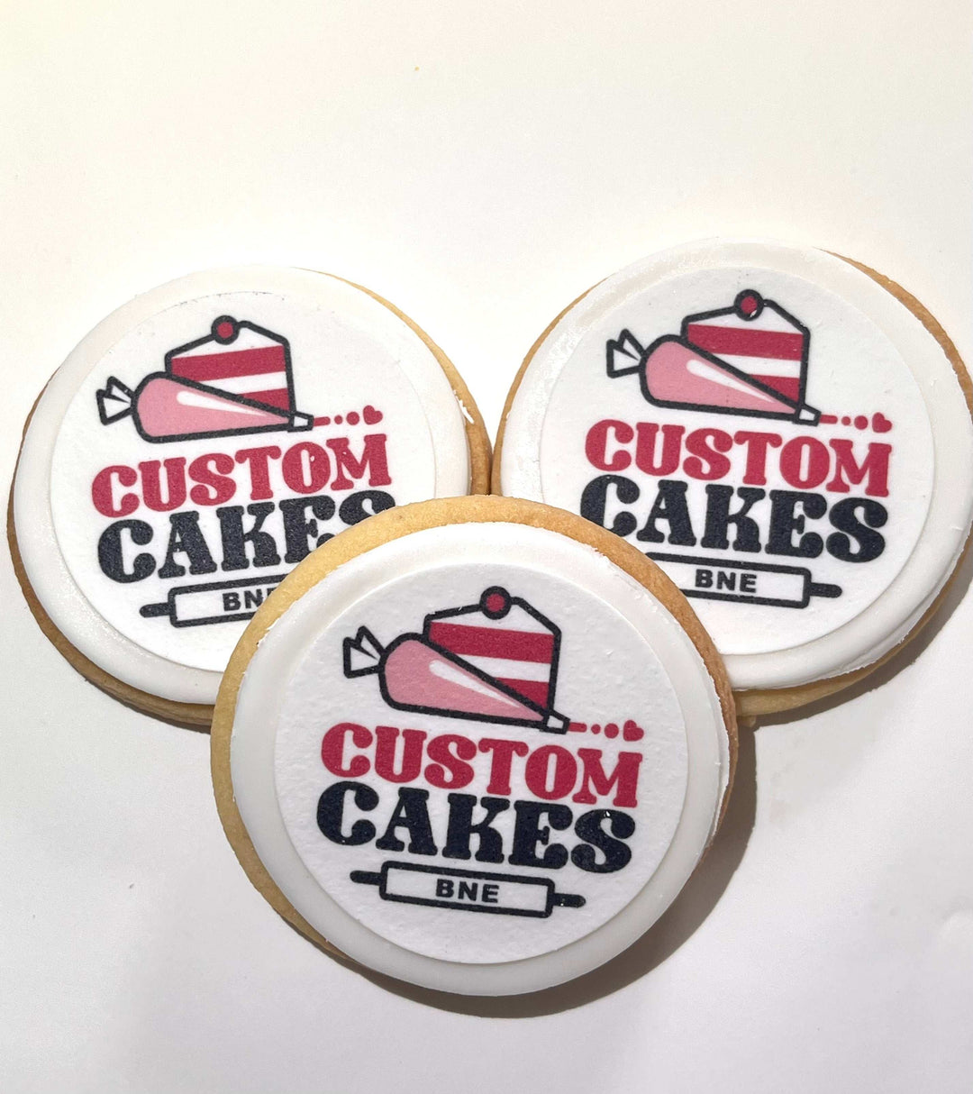 Branded logo sugar cookies with edible prints, neatly arranged for corporate events and promotional giveaways