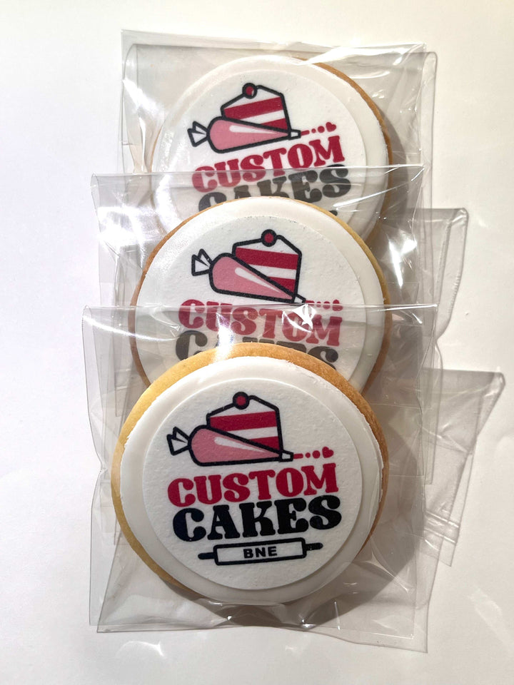 Personalized edible image cookies with printed messages and designs for themed parties and celebrations.