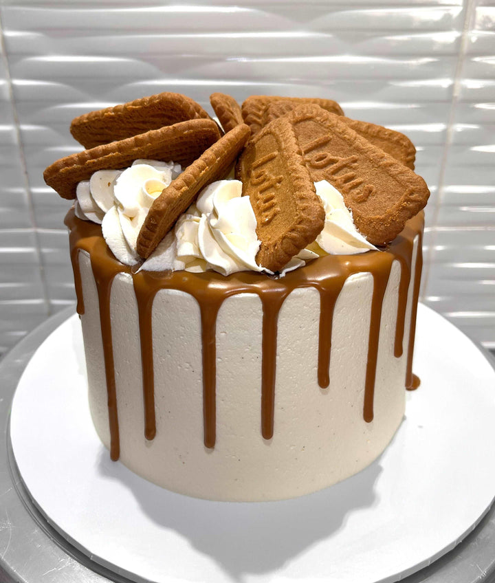 Delicious Biscoff cake available in Brisbane, topped with creamy Biscoff spread and crunchy biscuit crumbs, perfect for birthdays and special occasions