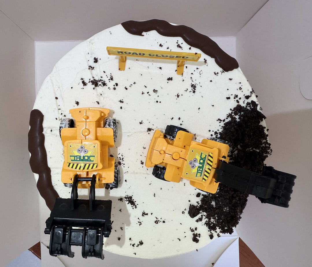 digger cake with construction themed toys